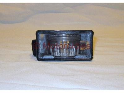 Nummerskyltsbelysning vänster